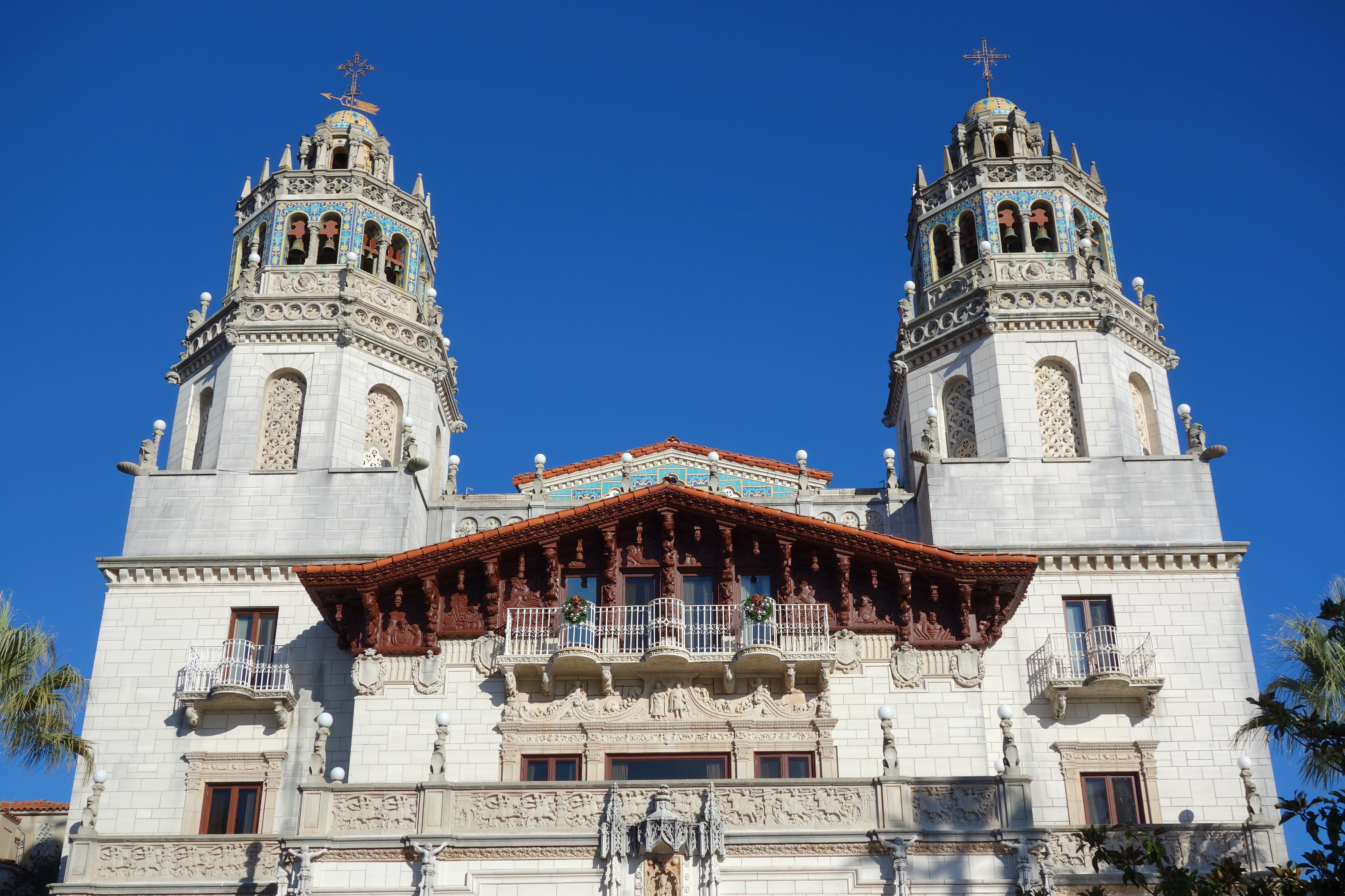 The front facade of Casa Grande, the main house at Hearst Castle in San Simeon, with its ornate Spanish Colonial Revival towers.